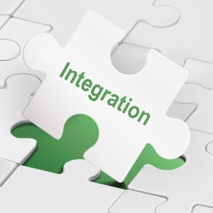 integration word on white puzzle pieces